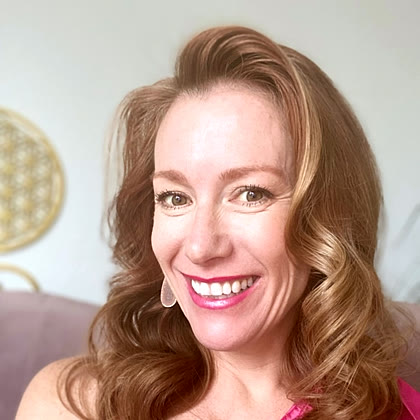 Tamara Rose smiling in a pink top