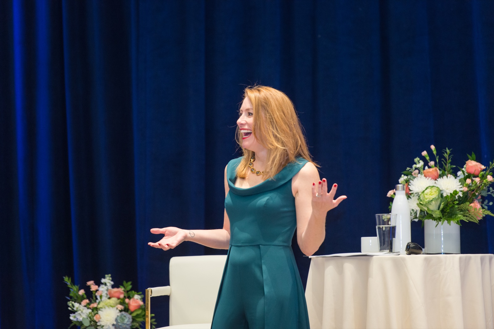 Tamara Rose laughing as she teaches on stage